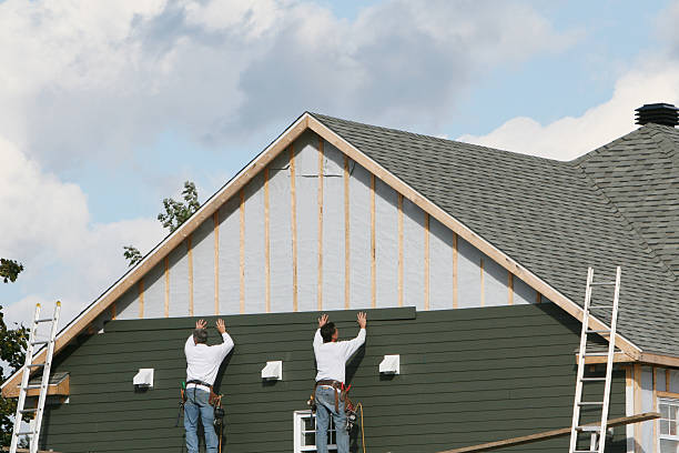 Professional Siding technician working in Belmont, OH